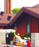 Statue emerges from packing crate.