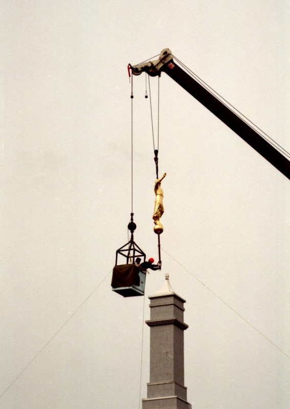 Support pole is guided into place.