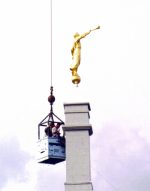 Trumpet is installed; workers lowered.