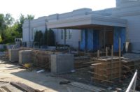 Rear form and rebar for the East wall take shape between the poured footings (8 Sept 2011).