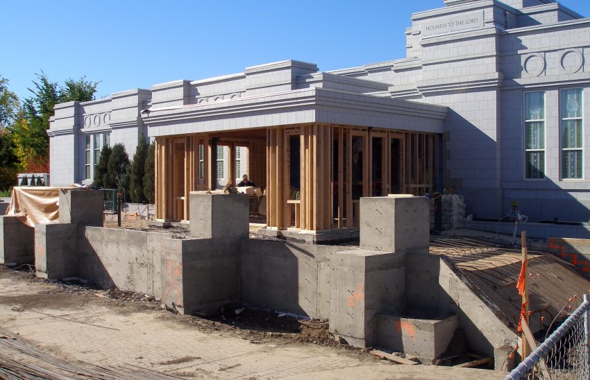 Toward the end of September, the portico enclosure framing takes shape.