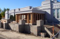 Toward the end of September, the portico enclosure framing takes shape (26 Sept 2011).