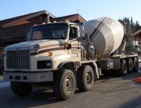 The transit mix truck delivers the concrete for the wheel chair ramp abutments, and roadway stringers (7 Nov 2011).