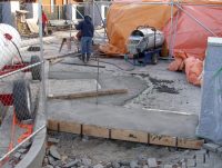 The North side wheel chair ramp abutments and the first walkway stringer are poured and finished (7 Nov 2011).