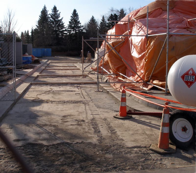 The roadway in front of the new entryway is ready for paving stone.