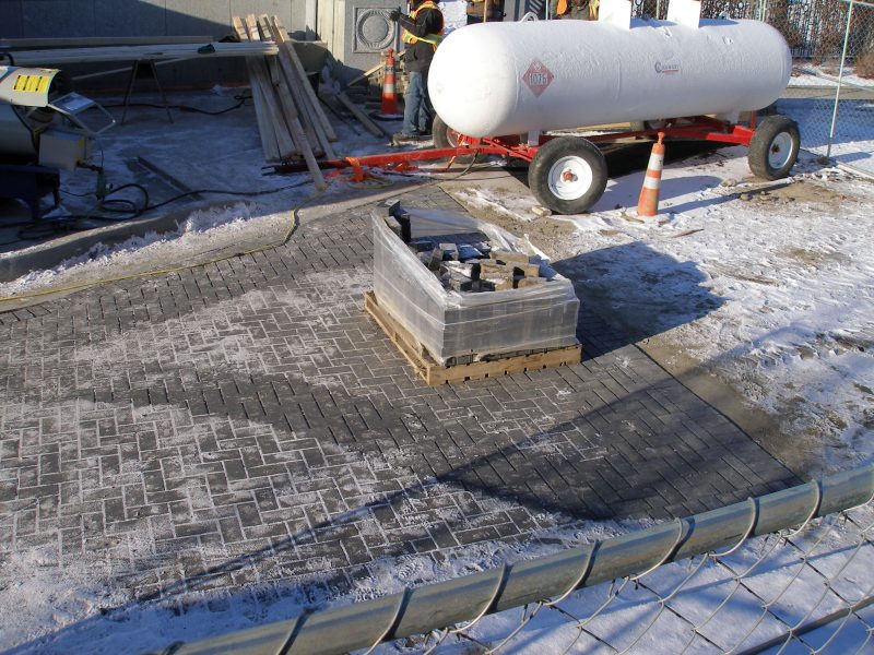 By mid-november, near project close, the paving stones for the roadway are in place.