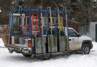 Art glass windows are delivered for the North side windows, and perhaps for the portico (18 Nov 2011).