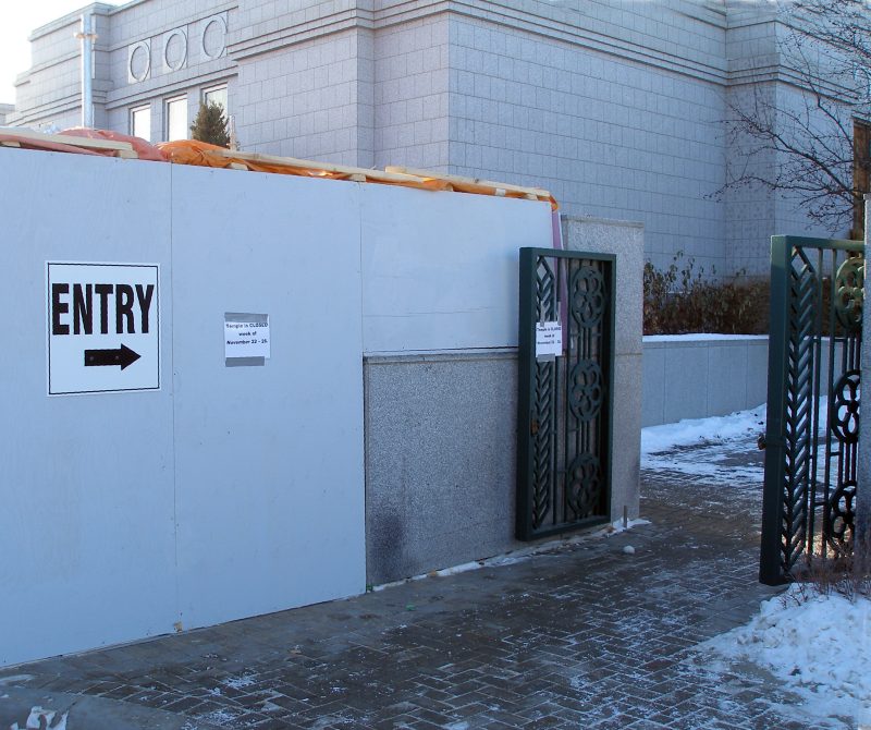 The temporary entry gateway is identified for patrons.