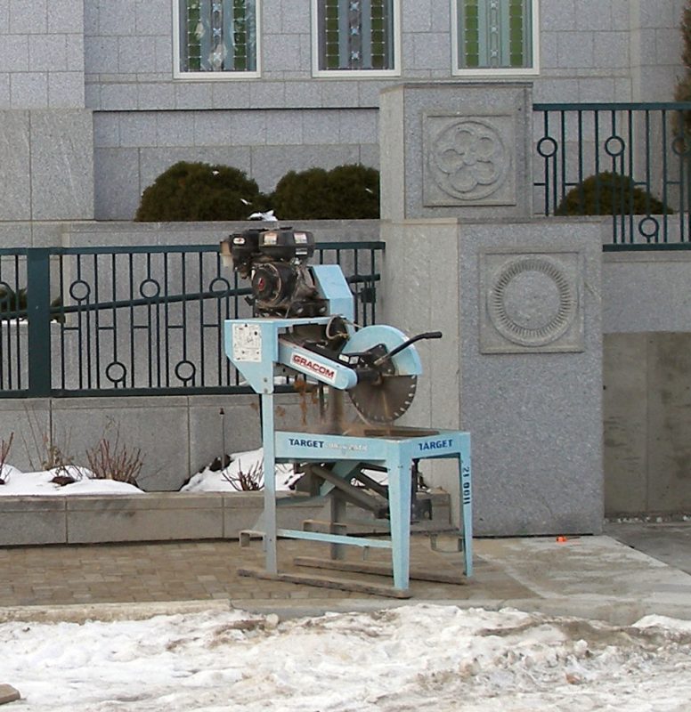 The wet saw for cutting the stone is readied.