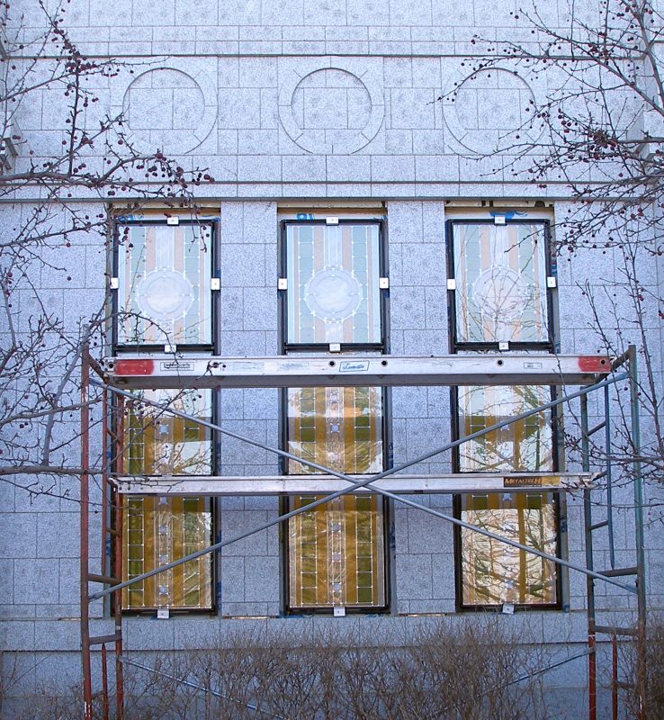 All three art glass windows are placed in their frames.