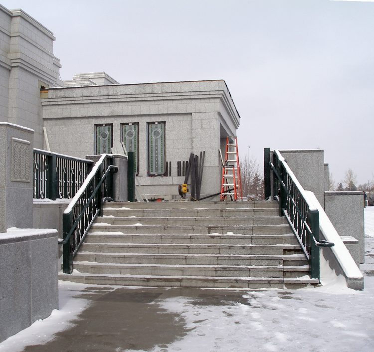 The stone work on the South stairs and planters is complete.