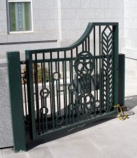 Sheaves of wheat and the Alberta Rose motifs are built into the fencing atop the stairs (30 Mar 2012).